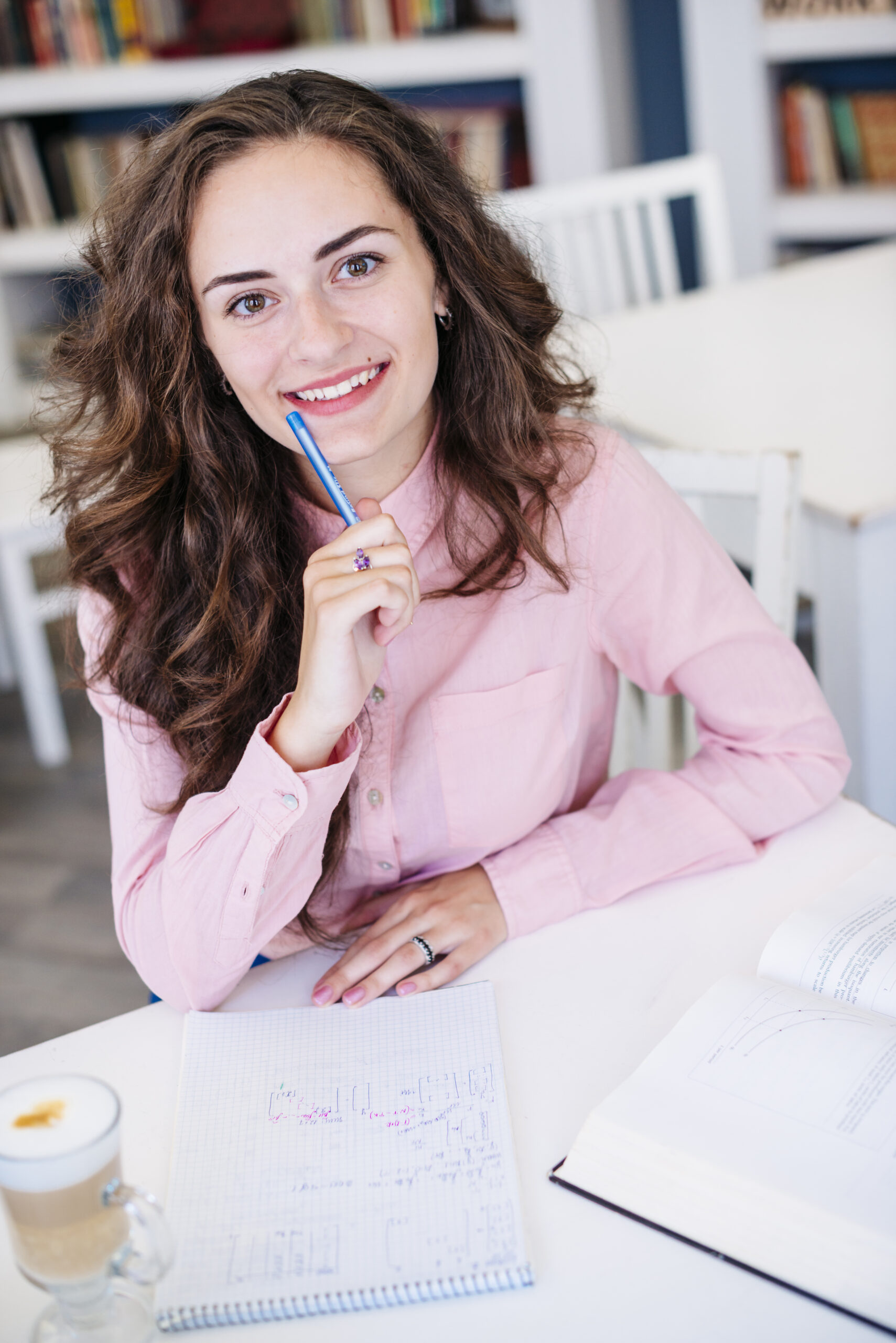 young woman studying desk